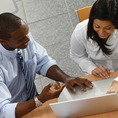 Man and Woman business meeting with laptop